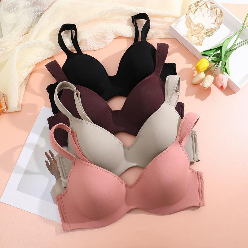 peach-colored, lightly padded underwire bra with adjustable straps