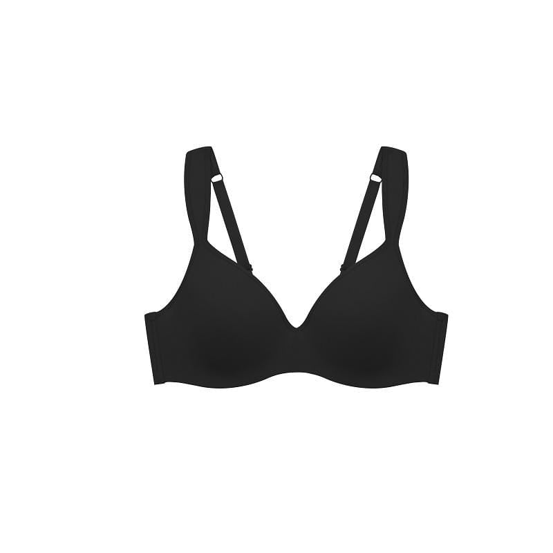 peach-colored, lightly padded underwire bra with adjustable straps